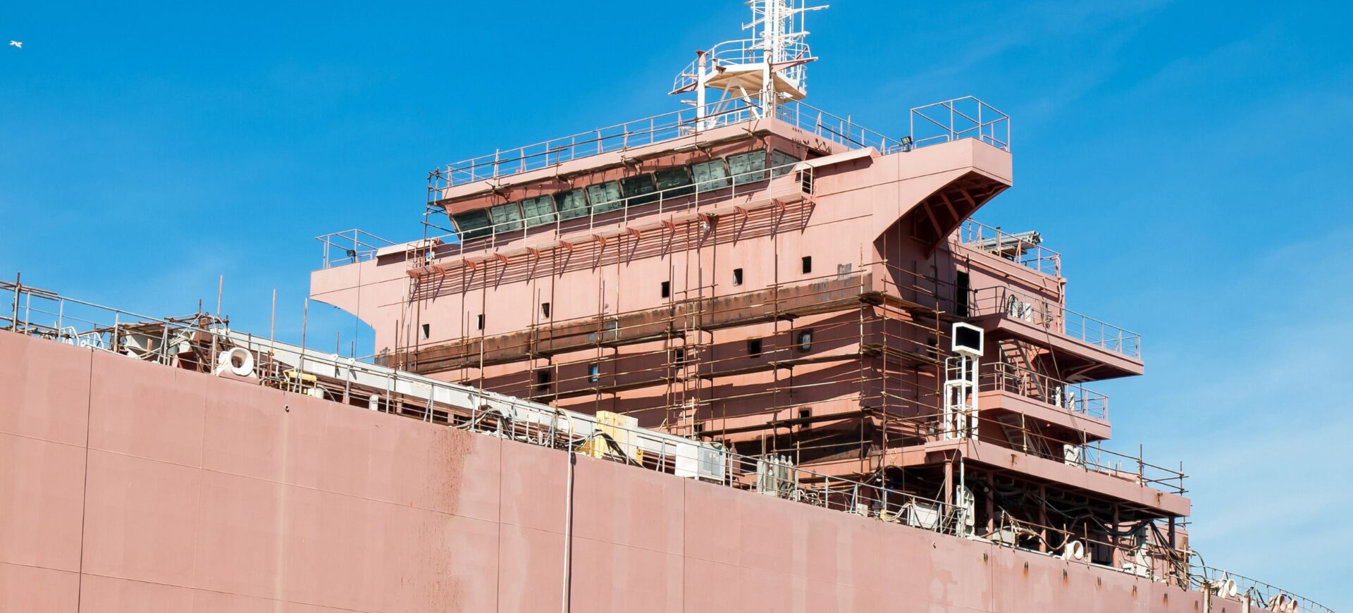Blog 10 Scaffolding erect around large container ship in shipyard