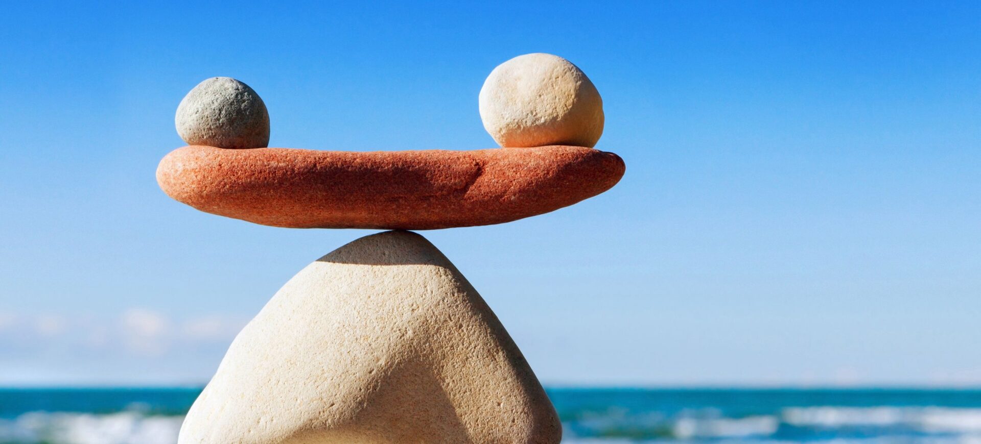 Blog 5 balancing stones on a beach