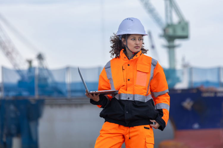 Shipyard Engineer Working on Laptop